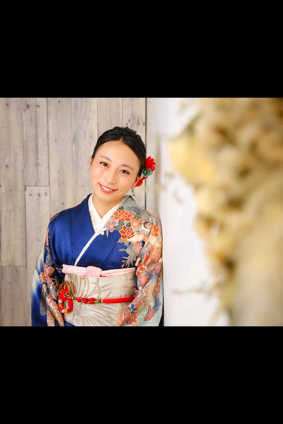 紫色の着物を着る女性